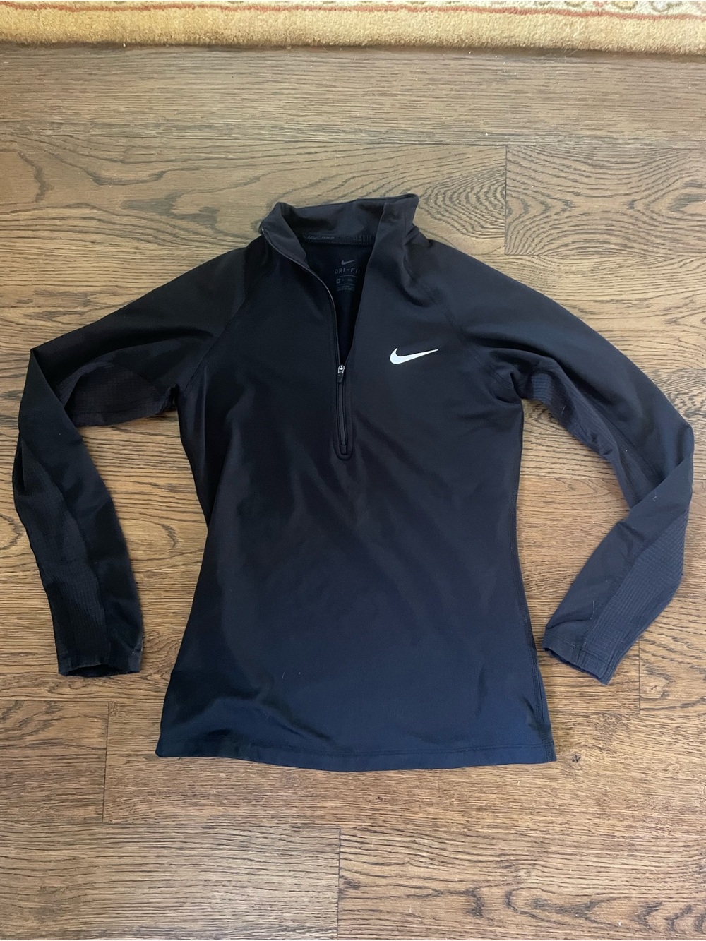 Nike Women's Black Long-Sleeve Half-Zip Athletic Top with White Swoosh - Size XS